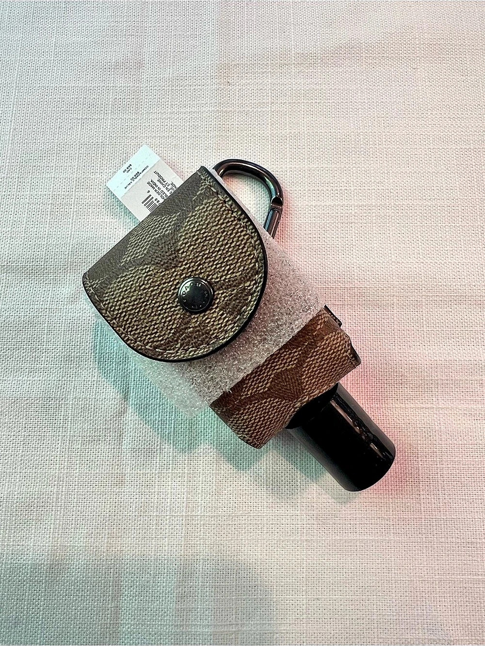 COACH Hand Sanitizer Holder In Signature Canvas Brown & Black Mini Bag